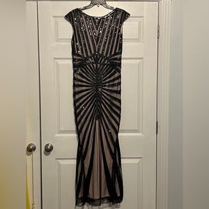 NWT Metme formal dress! size large, black and nude design. in perfect condition.